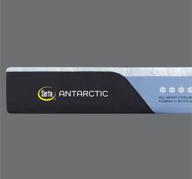 Close-up side profile of the Serta Antarctic mattress border displaying the black and light blue two-tone design with All-Night Cooling Powered by Cooltex branding