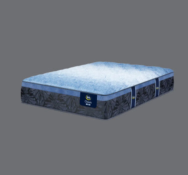 Full angled view of Serta Classic Latex mattress displaying soft blue plush tufted top and deep navy blue floral-patterned base with Classic Latex brand label on grey background