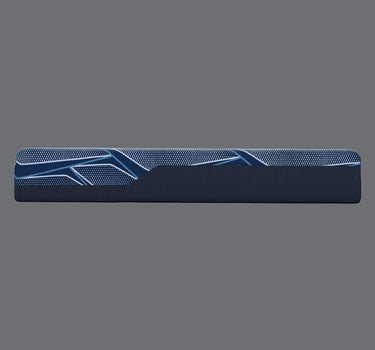 Slim side profile view of Serta iSeries NXG Hybrid mattress highlighting the blue geometric-patterned border and navy base on a grey background