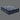 Angled view of Serta Perfect Sleeper Hybrid mattress displaying bold navy and grey floral radial-patterned pillow-top surface and solid navy blue base with brand label