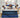 Happy family with two children playing on a Serta Perfect Sleeper mattress with white dash-quilted top and blue oval-patterned border on a navy upholstered bed frame
