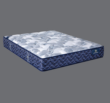 Full angled view of Serta PerfectSpine mattress with white and blue wave-patterned quilted top and navy rope-pattern side border